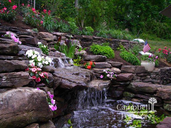 flowers and rock waterfall landscape alexandria va