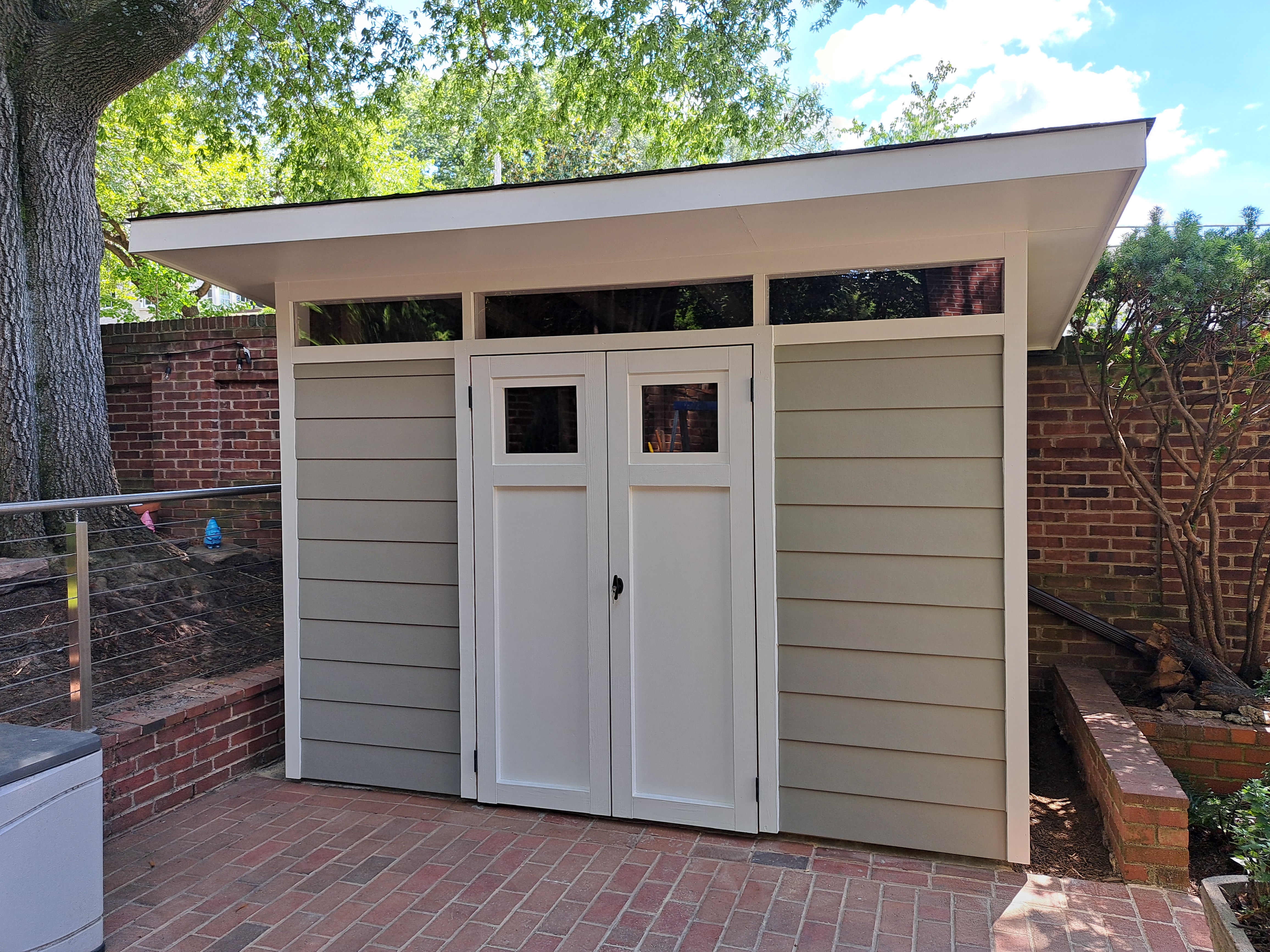 custom shed with landscaping