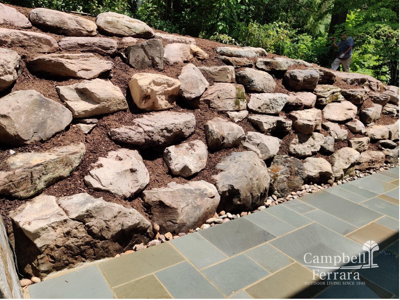 Boulder retaining walls